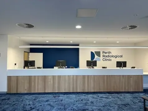 Clean commercial carpet in front of a reception counter