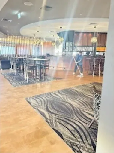 Feature rug on timber flooring in a hospitality venue