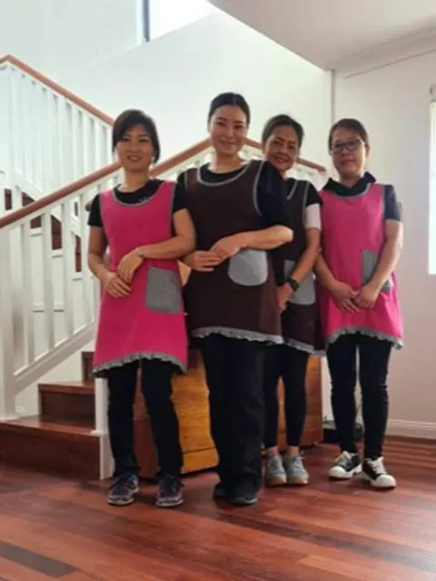 The Living Fresh Cleaning house cleaning team in uniform at a client's home in Perth