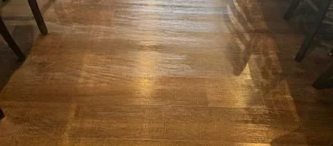 Polished timber floor and seating in a venue after floor care